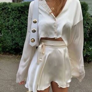 Orseund Iris Cream raw-hem cropped cardigan and ballet skirt